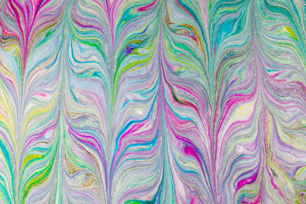 istock Texture created with paint of varied metallic colors and glitter 1355514839
