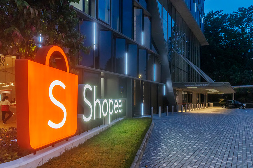 Singapore, Singapore - 2021: A large Shopee logo at the entrance to the e-commerce platform's headquarters at Science Park. (Exact photography date unknown due to incorrect camera settings)