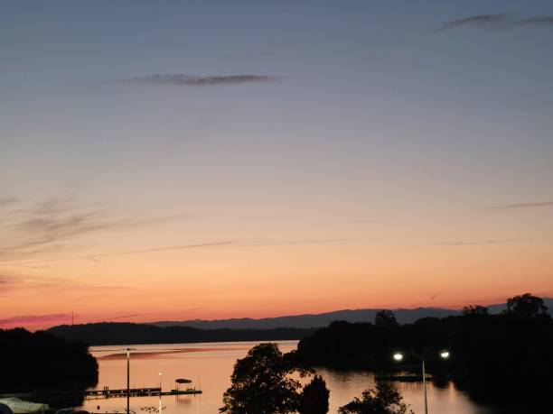 istock Sun rise over the lake 1355516867