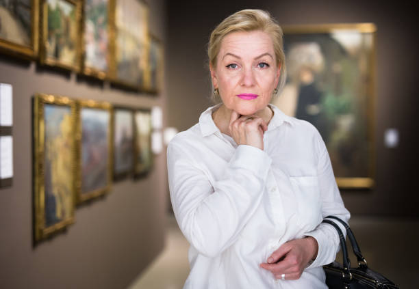 istock Closeup on mature female visiting museum 1355517060
