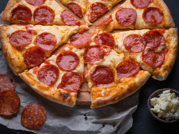 istock Pepperoni pizza with sausage 1355518692