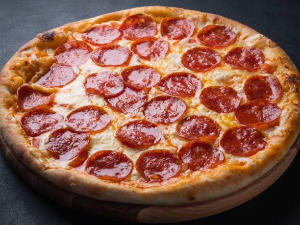 istock Pepperoni pizza with sausage 1355518701