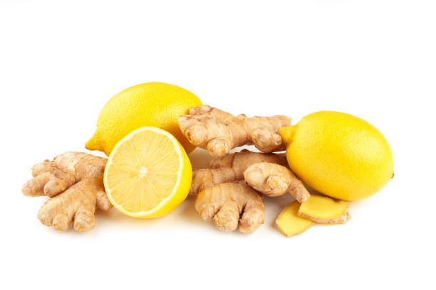 istock Lemon and ginger isolated on a white background 1355524342