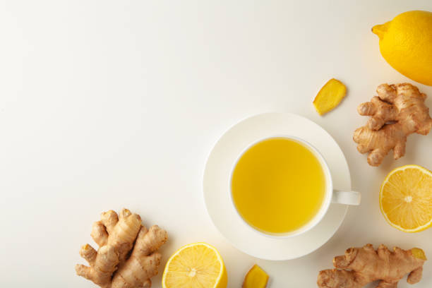 istock Ginger tea with lemon and honey on white background. 1355525780