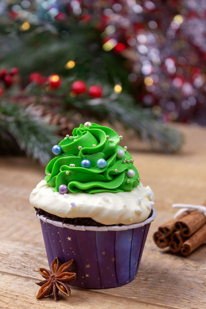 istock Cupcakes in the shape of a Christmas tree, Christmas decorations.Selective focus, place for text. 1355528517