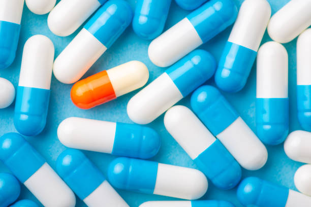 istock Background of pills capsules 1355529934
