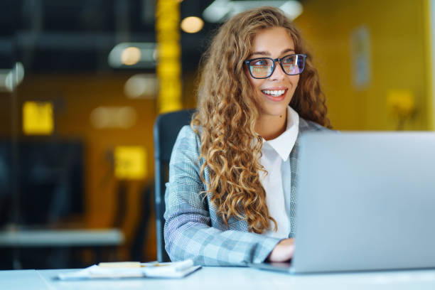 istock Young operator woman with headsets working in a call centre. 1355534395