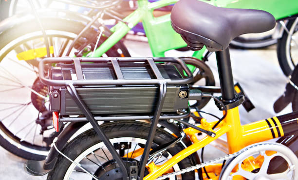 istock Lithium ion battery on bicycle luggage carrier 1355535319