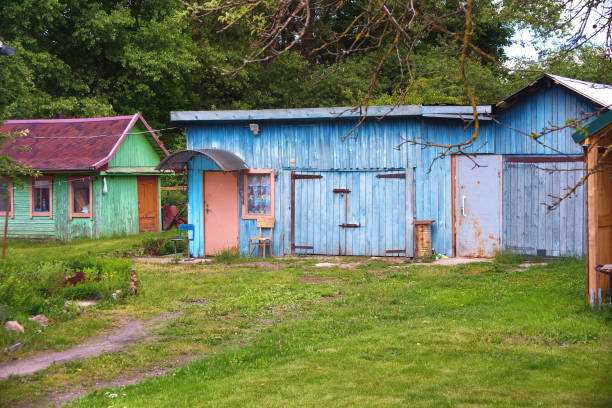 istock Small old wooden huts in the village 1355535772