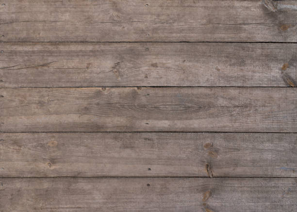 istock Old weathered brown wooden background 1355537682