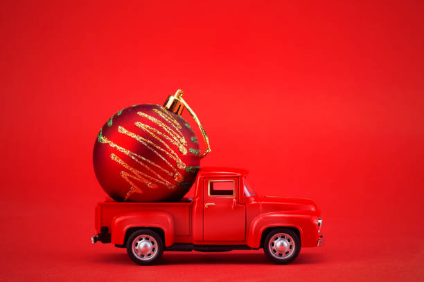 istock Toy car with christmas ornament 1355539304