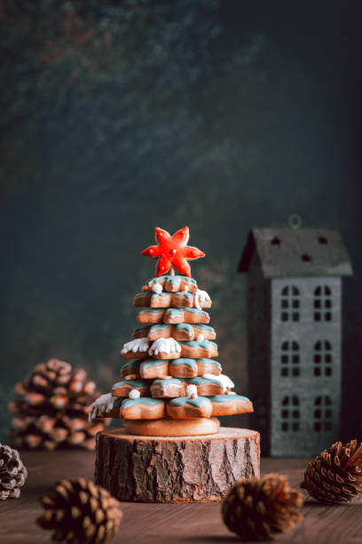 Gingerbread Christmas tree on dark table, Christmas card