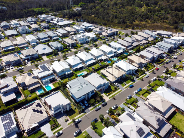 istock Aerial view of new modern suburb, background with copy space 1355541989