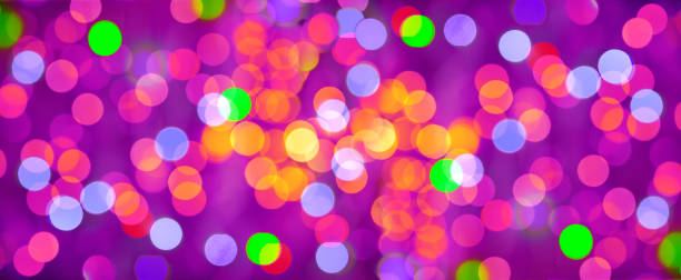istock Lights of the festive background. Abstract, bright multicolored background, blurred bokeh, banner. 1355543710