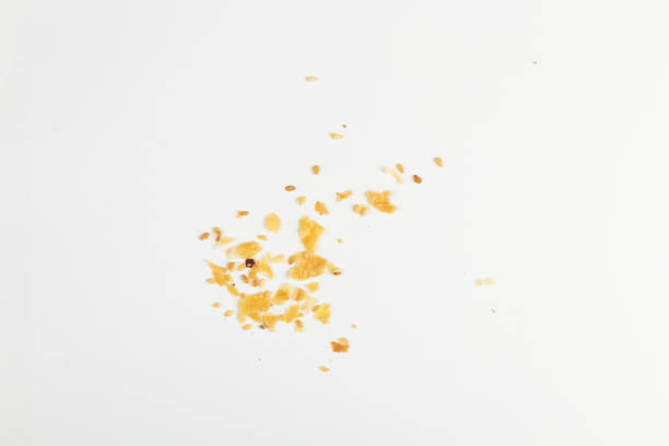 istock Scattered crumbs isolated on white background 1355548724