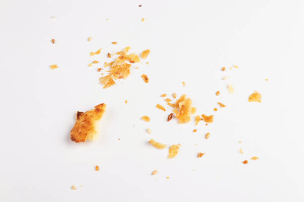 istock Scattered crumbs isolated on white background 1355549641