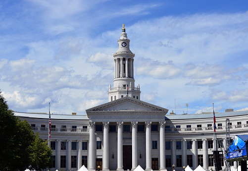 Denver, Colorado, USA: Denver City and County Building - portico and curved wings with colonnades of Ionic columns -  Beaux-Arts Neoclassical style, Allied Architects, Robert K. Fuller and Associated Architects - Bannock Street and Civic Center Park.