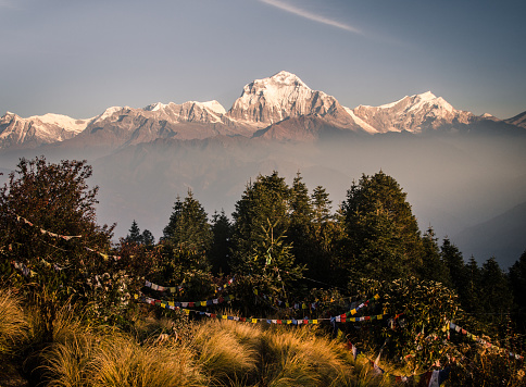Beautiful sunrise over the fog at poon hill with views towards Annapurna range in nepal