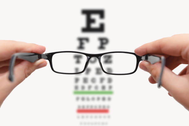 istock Glasses and Snellen's chart. Test eye examination 1355553097