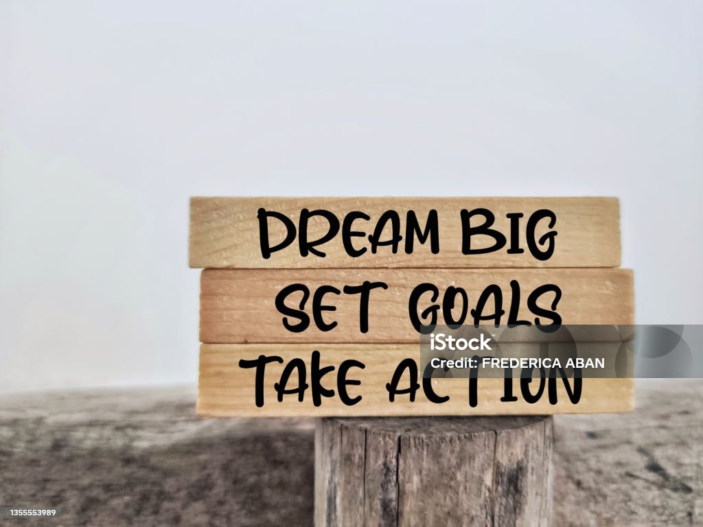 Aspiration Concept Dream big set goals take action text background. Stock photo. Inspirational Quote Stock Photo