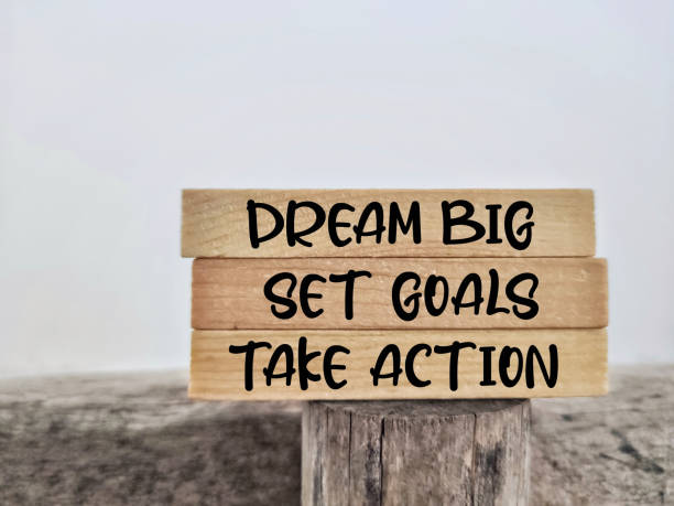 Aspiration Concept Dream big set goals take action text background. Stock photo. achievement aiming aspirations attitude stock pictures, royalty-free photos & images