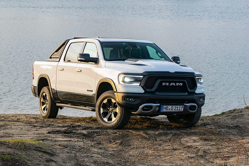 Berlin, Germany - 12 January, 2020: RAM 1500 Rebel stopped on unmade road. RAM is one of the most popular pickup vehicles in North America.