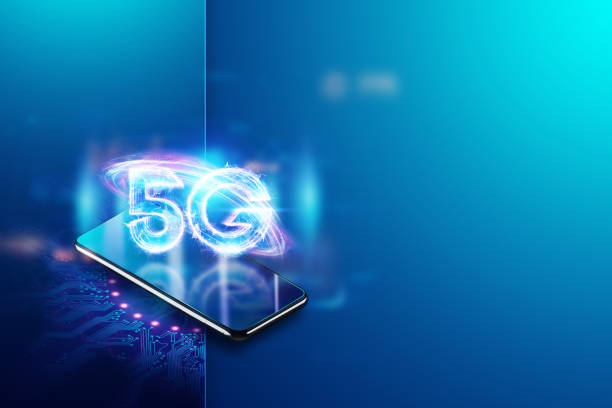 istock Smartphone glows 5G hologram, mobile technology, creative background. 5G network concept, high speed mobile internet, new generation networks. Mixed media. 3d render, 3d illustration. 1355566163