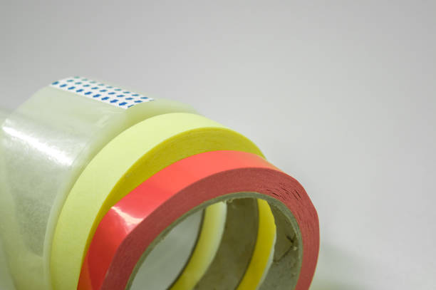 istock Scotch tape and paint tape. Stationery and construction consumables. Selective focus. 1355571102