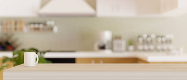 istock Modern light wooden kitchen countertop with copy space 1355575926