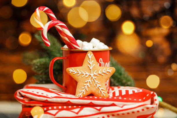 istock Red mug with hot chocolate. Winter holiday decoration. Holidays 1355578041