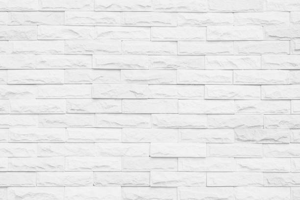 istock White grunge brick wall texture background for stone tile block painted in grey light color wallpaper modern interior and exterior and room backdrop design 1355580820