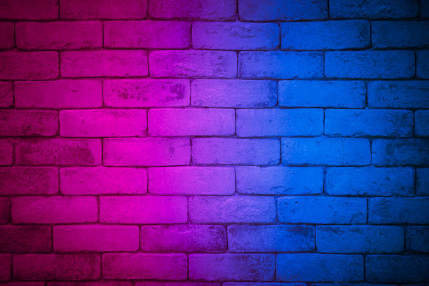 istock Lighting effect red and blue on empty brick wall background. Backdrop decoration party happy new year happiness concept, Showing or placing products. Lighting effect pink and cyan wall background. 1355581028