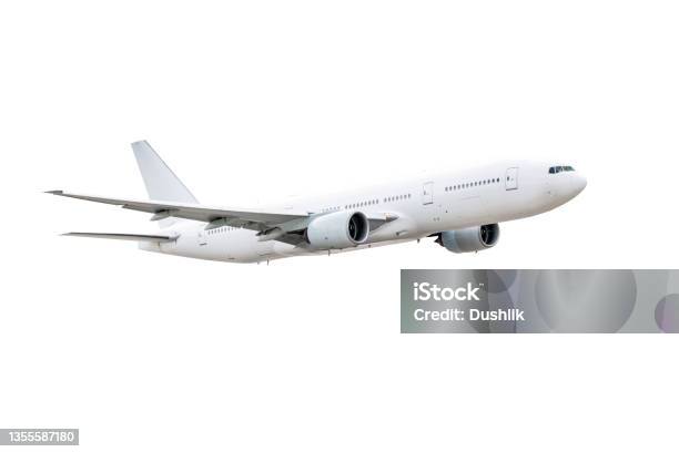 Flying White Wide Body Passenger Airplane Isolated On White Background Stock Photo - Download Image Now