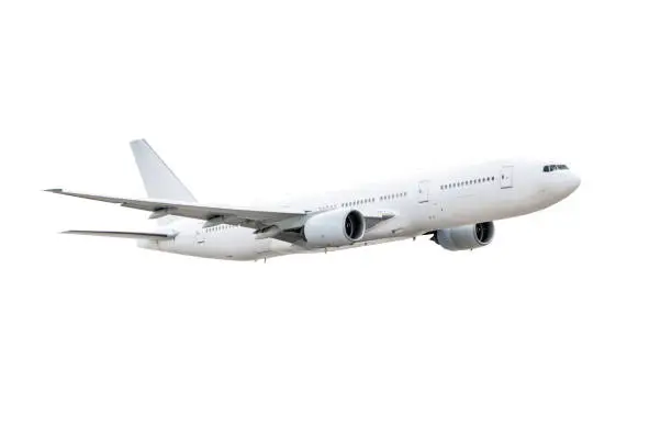Photo of Flying white wide body passenger airplane isolated on white background