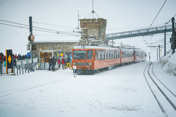 People at Gornergrat railway station (3.089 m) above Zermatt town in Mattertal, Valais canton, Switzerland, in winter. Taken by Sony a7R II, 42 Mpix.