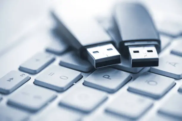 Flash drives on the computer keyboard