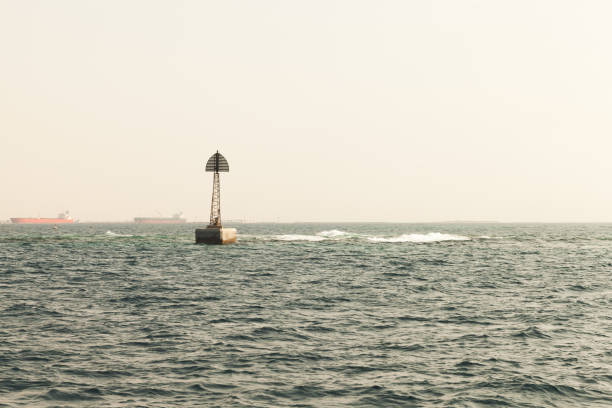 istock Beacon tower is on the border of a fairway 1355604955