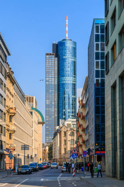 istock Maintower in Frankfurt with street train 1355608062