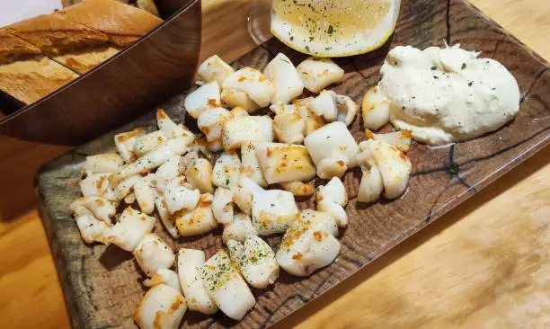 Grilled cuttlefish ration with ali oli mayonnaise