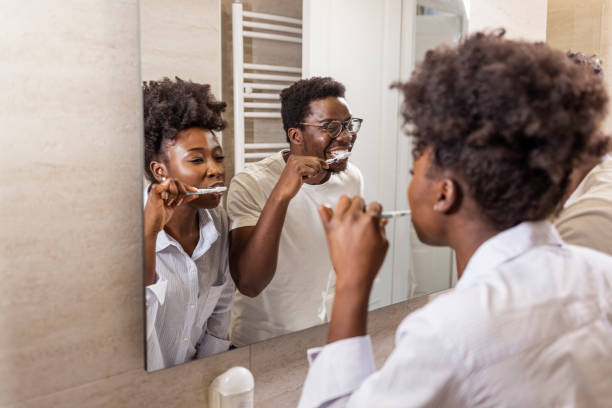 istock Couple doing a morning hyginene together. 1355618662