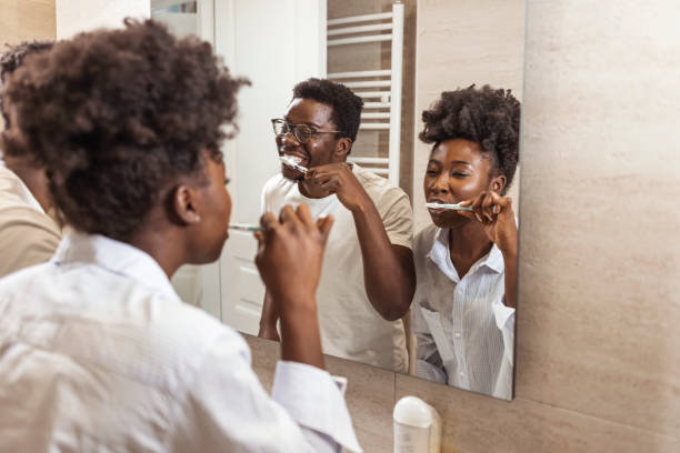 istock Couple doing a morning hyginene together. 1355621512
