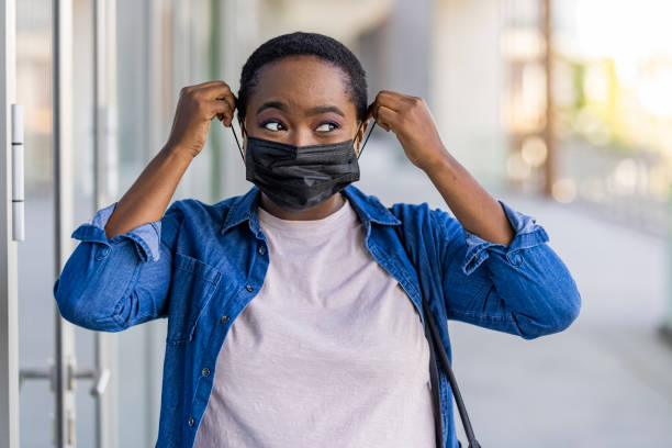 istock Young woman with a mask during pandemic. 1355626629
