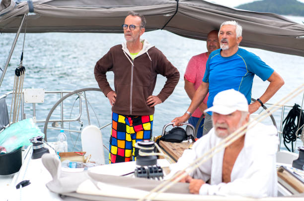 istock A men on a sailboat looking ahead while sailing, Croatia 1355626662