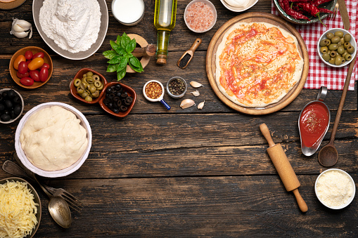 Pizza Ingredients On wooden Table In A Raw - Italian Food