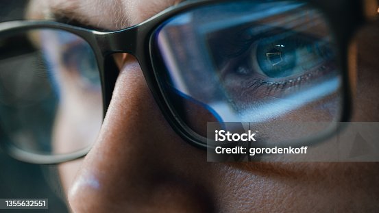 istock Close-up Portrait of Software Engineer Working on Computer, Line of Code Reflecting in Glasses. Developer Working on Innovative e-Commerce Application using Machine Learning, AI Algorithm, Big Data 1355632551
