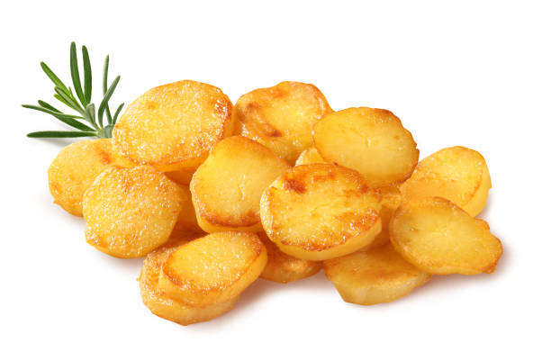 Fried potatoes deliciously golden fried potatoes with twig of rosemary fried potato stock pictures, royalty-free photos & images