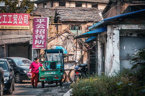 Shanghai, China - November 5, 2019: Local street food on Ninghai East Road close to the city center. These street food typical for old residential district also known as a shikumen houses.