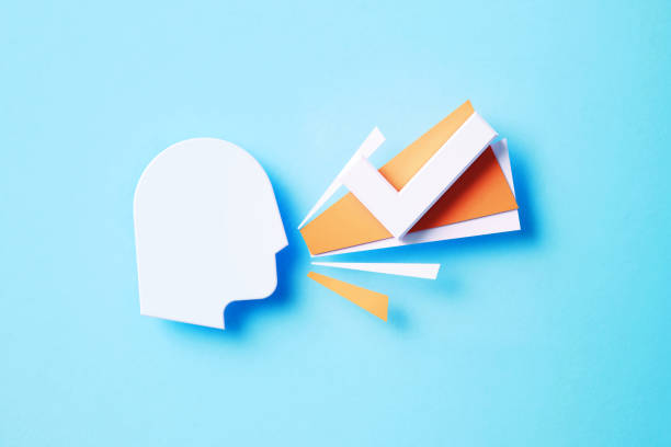 istock Check Mark Sitting Next To Human Head On Blue Background 1355634155