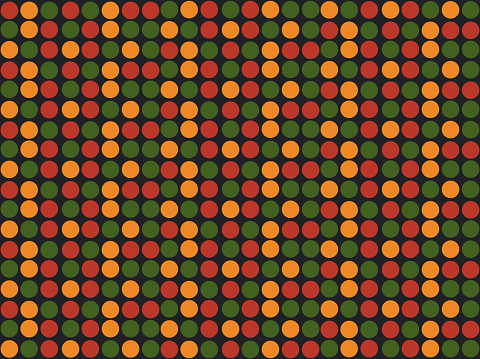 Bright abstract geometric seamless pattern with circles, dots in traditional African colors red, yellow, green on black background. Ditsy backdrop for Kwanzaa, Black History Month, Juneteenth design.