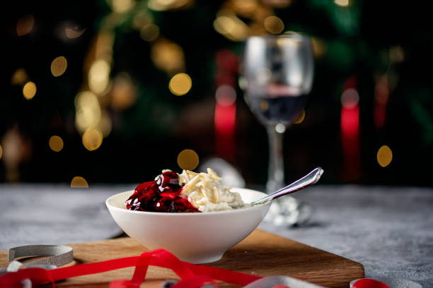 Risalamande Close up picture of a traditional danish rice pudding or risalamande dessert served at Christmas time in Denmark and other parts of Scandinavia. It is traditionally served with a rich cherry sauce and chopped almonds. Usually there is a small silver coin hidden in the dessert that one lucky child will find. danish culture stock pictures, royalty-free photos & images